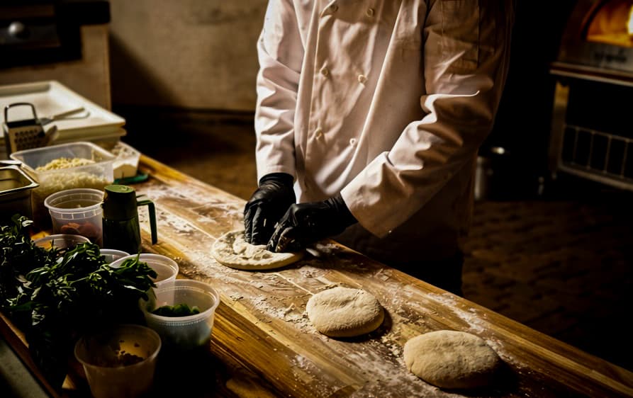 Stretching the dough by hand